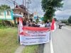 Mahasiswa Papua di Ambon Bagikan Aksesoris Bendera Merah Putih